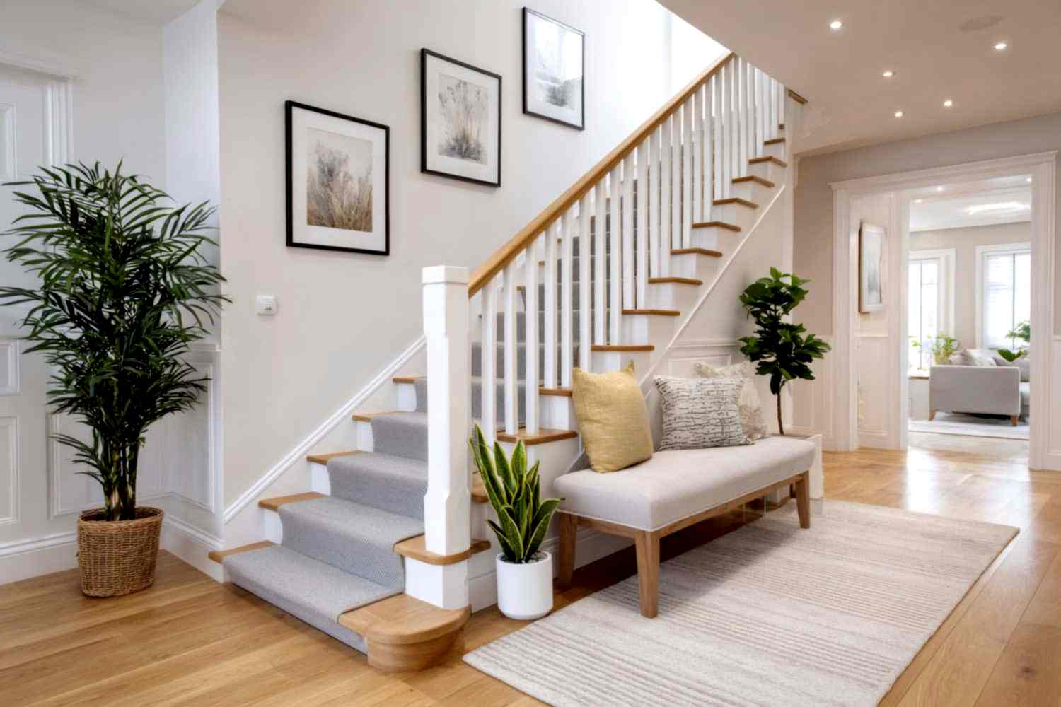 vecteezy_modern-home-entryway-with-bright-stairs-and-plants_73288182